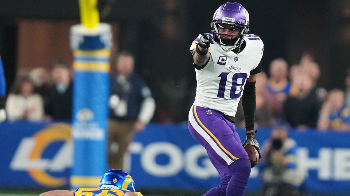 Minnesota Vikings receiver Justin Jefferson (18) signals a first down after a catch against the Los Angeles Rams during their playoff game at State Farm Stadium on Jan. 13, 2025, in Glendale.