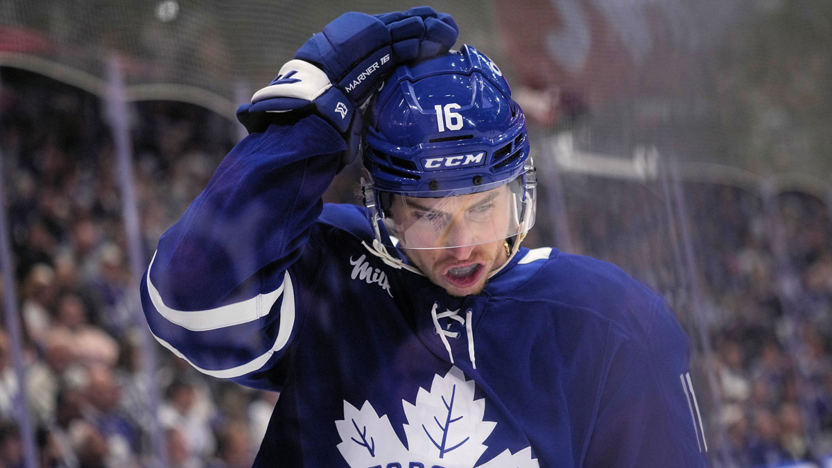 Toronto Maple Leafs forward Mitch Marner (16) adjusts his helmet after a play against the Florida Panthers during the first period of game seven of the second round of the 2025 Stanley Cup Playoffs at Scotiabank Arena