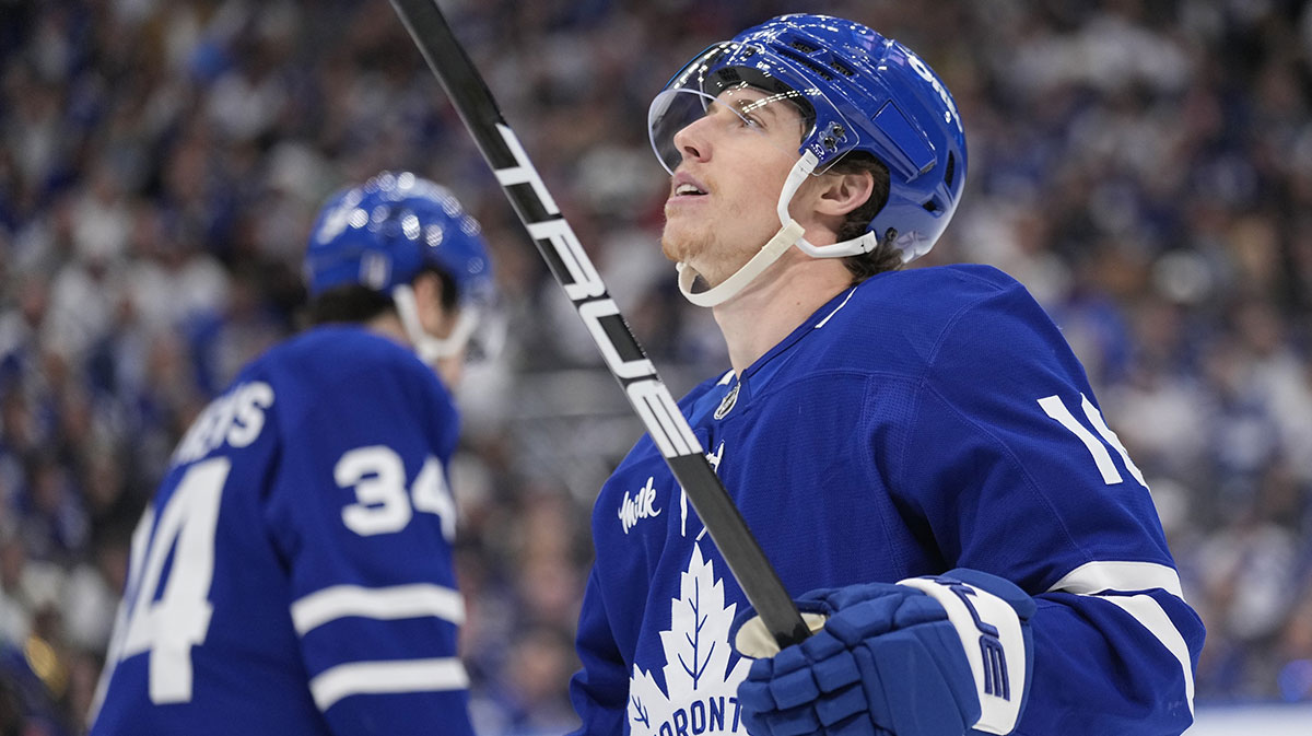 Toronto Maple Leafs forward Mitch Marner (16) looks up at the scoreboard as Toronto Maple Leafs forward Auston Matthews (34) skates to the bench during the third period of game seven of the second round of the 2025 Stanley Cup Playoffs against the Florida Panthers at Scotiabank Arena.