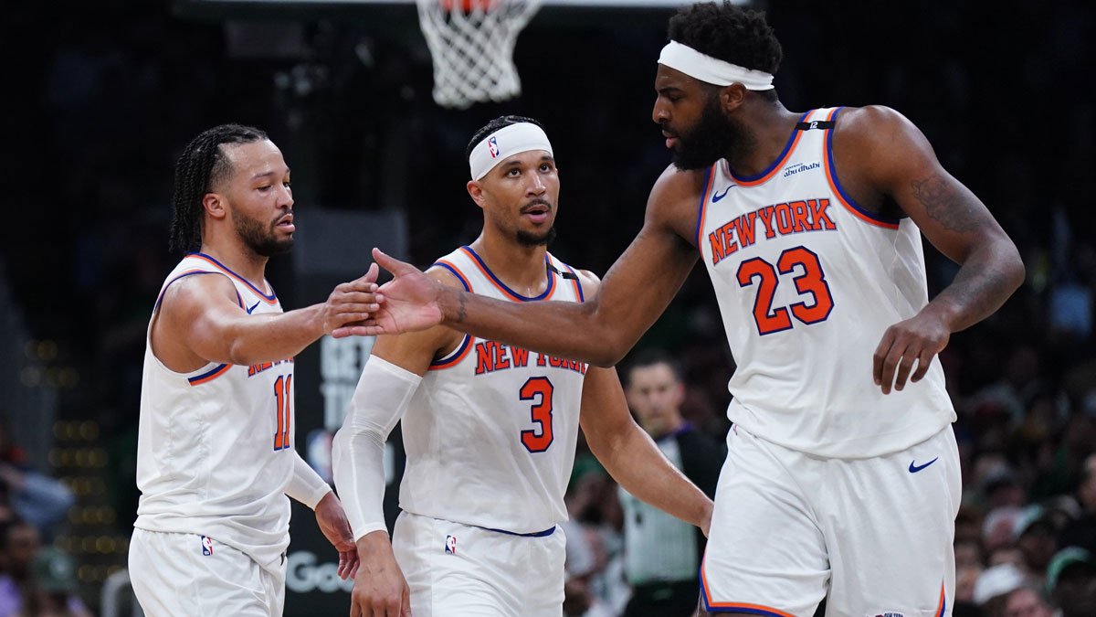 New York Knicks guard Jalen Brunson (11) and center Mitchell Robinson (23) react after a play against the Boston Celtics in the second half during game two of the second round for the 2025 NBA Playoffs at TD Garden.