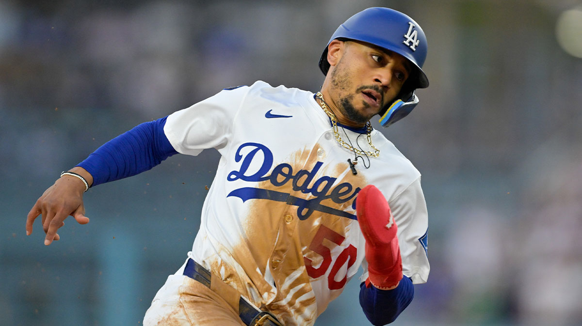 Dodgers shortstop Mookie Betts (50) rounds the bases against the Athletics during the first inning of the game at Dodger Stadium