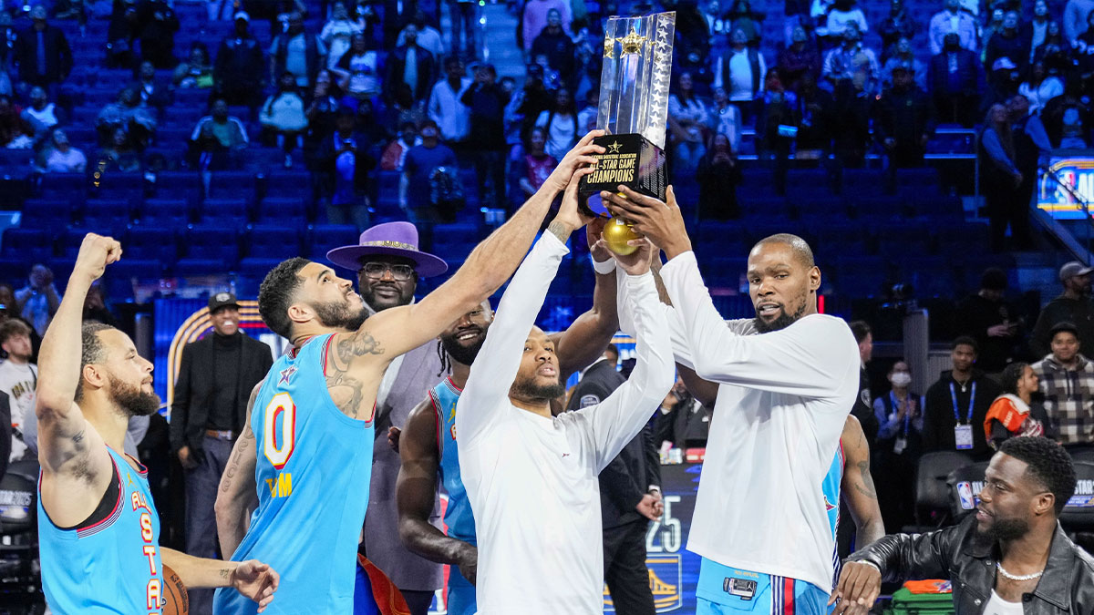 Shaq’s OGs guard Stephen Curry (30) of the Golden State Warriors and forward Jayson Tatum (0) of the Boston Celtics and guard Damian Lillard (0) of the Milwaukee Bucks and forward Kevin Durant (35) of the Phoenix Suns celebrate with the trophy after defeating Chuck’s Global Stars during the 2025 NBA All Star Game at Chase Center.