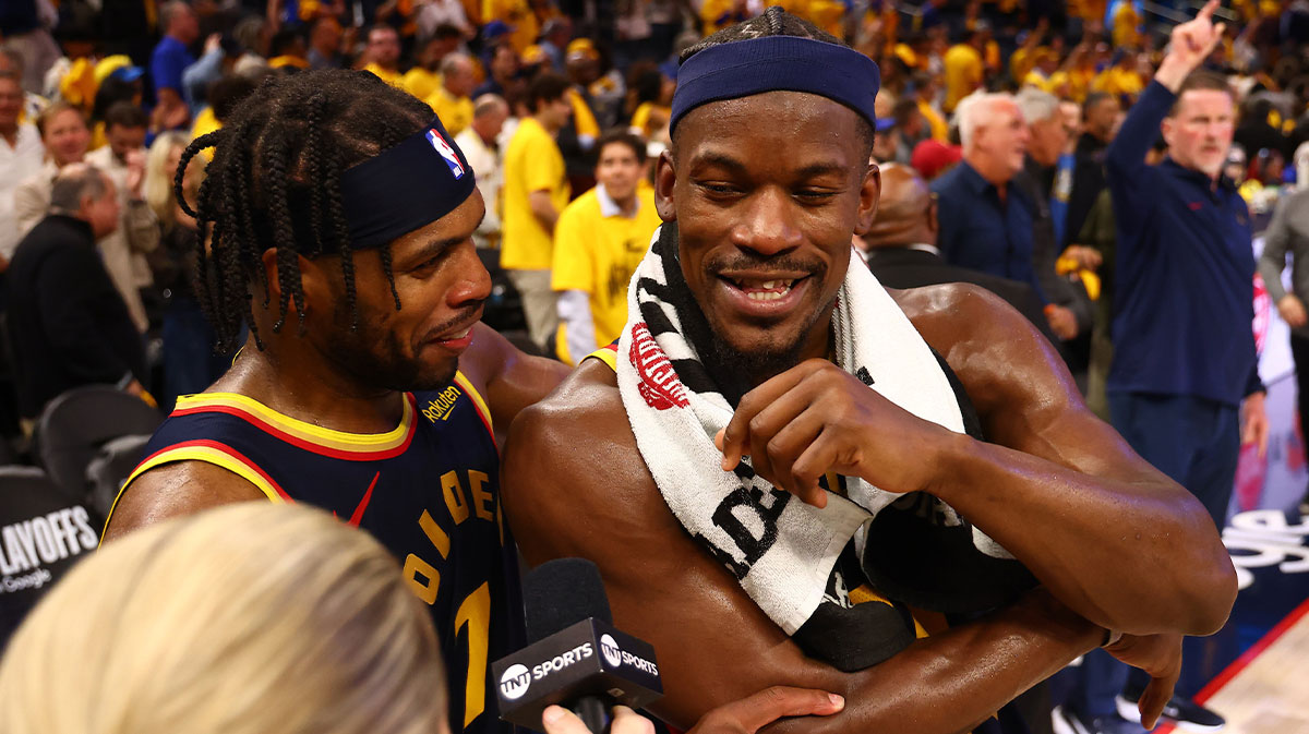 Golden State Warriors guard Buddy Hield (7) celebrates with forward Jimmy Butler III (10) as he speaks to TNT after the game four of the 2025 NBA Playoffs first round against the Houston Rockets at Chase Center.