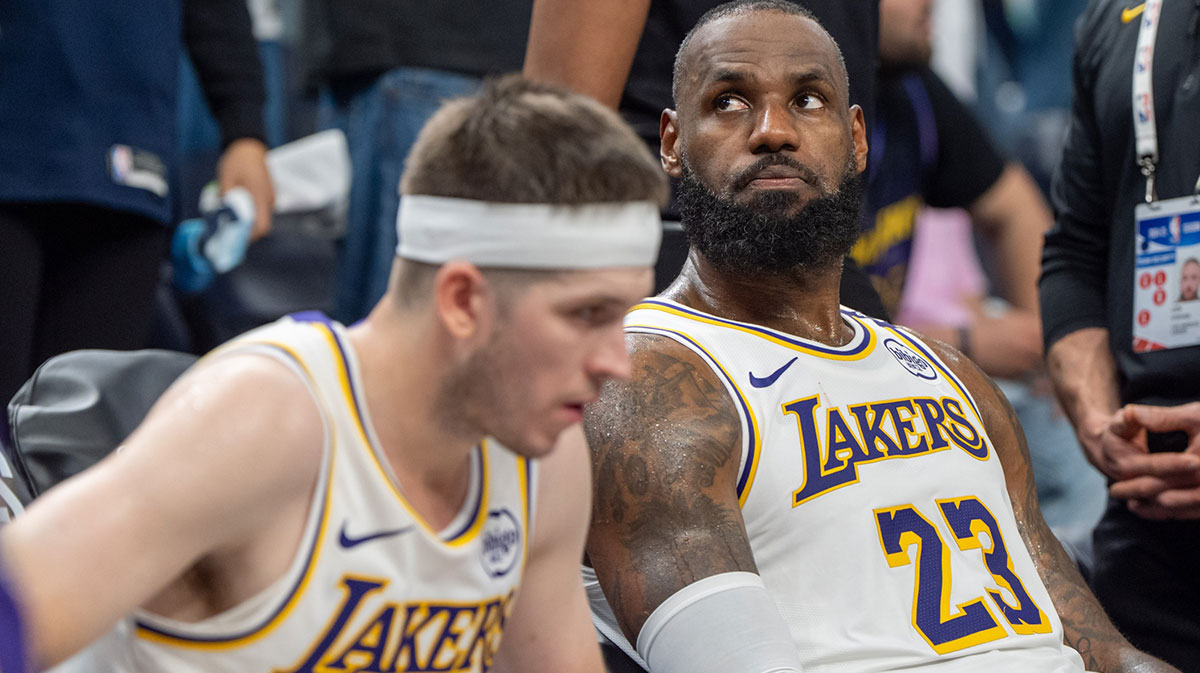 Los Angeles Lakers forward LeBron James (23) reacts to a replay that confirms he fouled Minnesota Timberwolves guard Anthony Edwards (5) in the fourth quarter during game four of first round for the 2025 NBA Playoffs at Target Center.