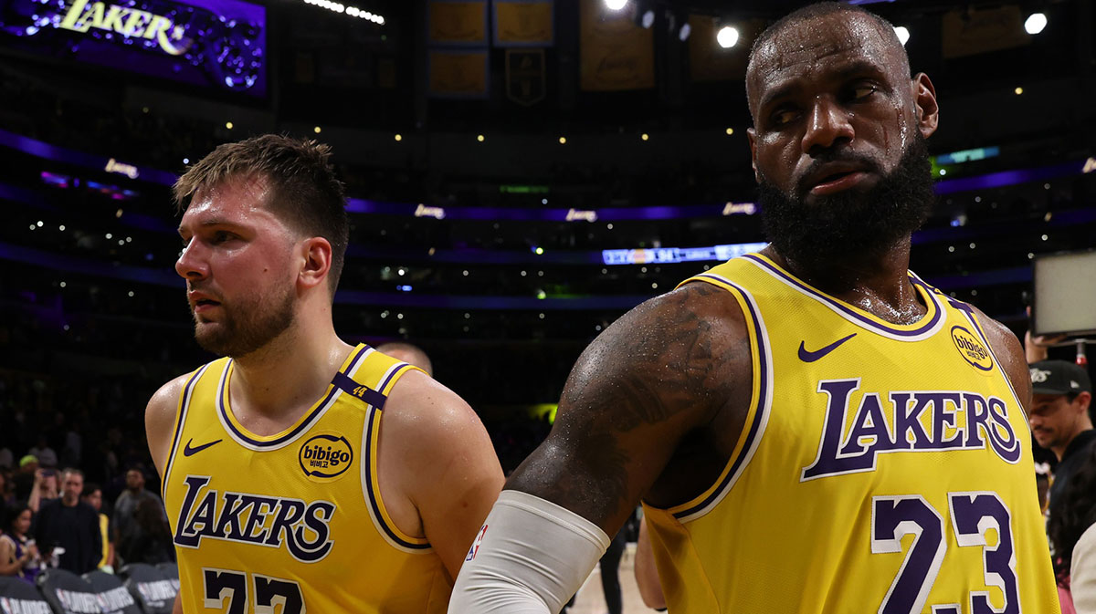 Los Angeles Lakers guard Luka Doncic (77) and Los Angeles Lakers forward LeBron James (23) leave a court after defeating the Minnesota Timberwolves 94-85 in game two of first round for the 2024 NBA Playoffs at Crypto.com Arena.