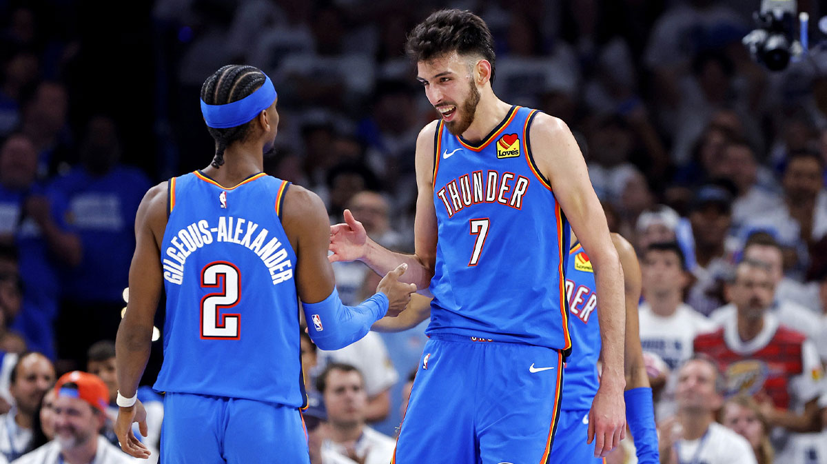 Thunder's Chet Holmgren and Shai Gilgeous-Alexander celebrate