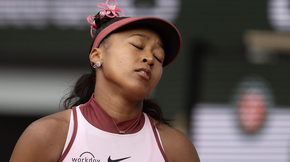 Naomi Osaka of Japan reacts to a point during her match against Paula Badosa of Spain on day two at Roland Garros Stadium.