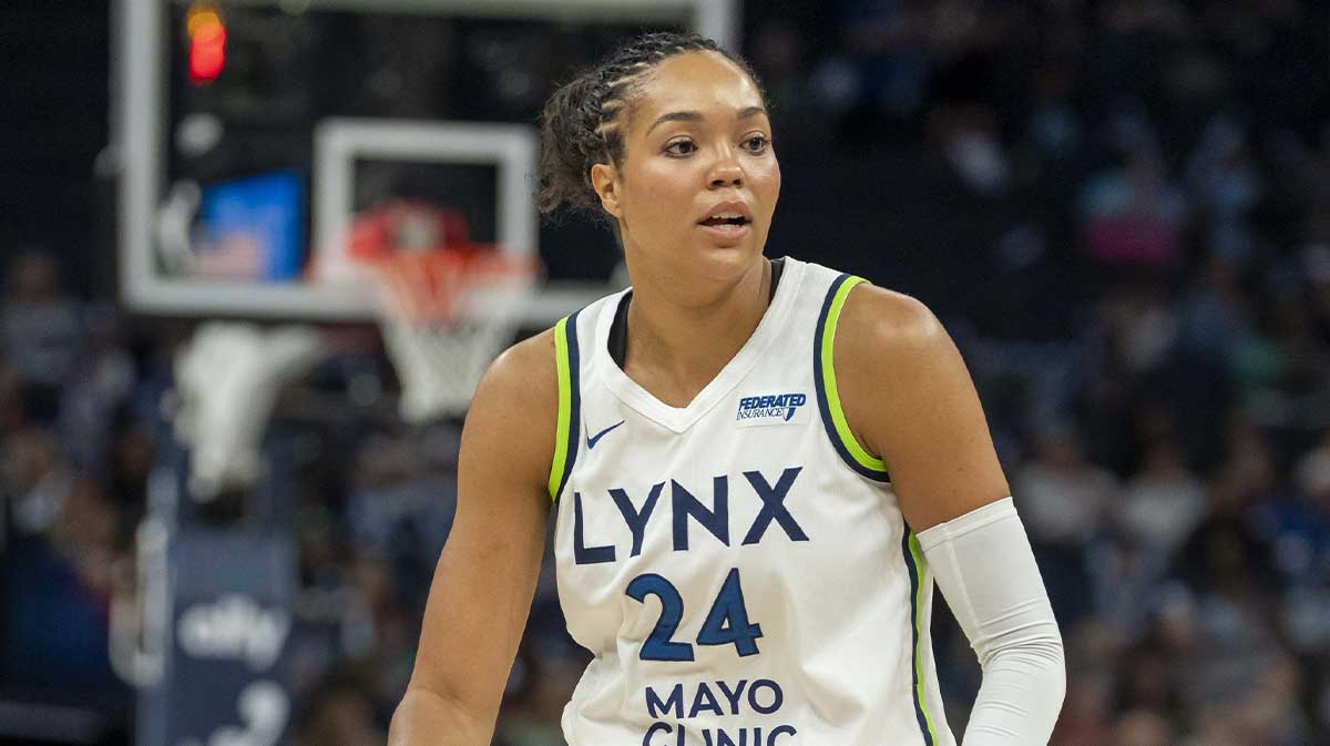 Minnesota Lynx forward Napheesa Collier (24) dribbles the ball against the Connecticut Sunin the first half at Target Center.