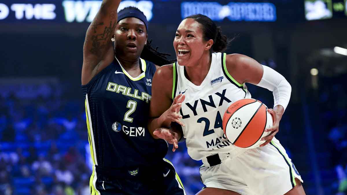 Minnesota Lynx forward Napheesa Collier (24) drives to the basket as Dallas Wings forward Myisha Hines-Allen (2) defends during the first half at College Park Center.