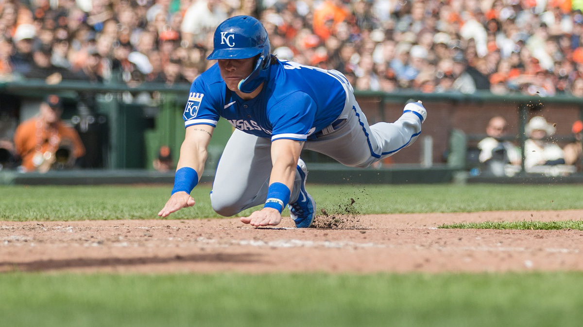 Kansas City Royals second baseman Nate Eaton (18) dives home to score after a wild pitch by San Francisco Giants relief pitcher Camilo Doval (75) during the ninth inning at Oracle Park.