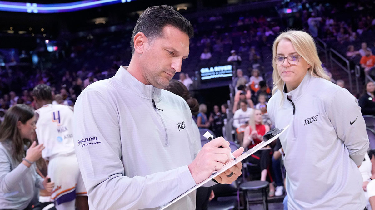 Phoenix Mercury head coach Nate Tibbetts draws a play before playing against the Golden State Valkyries in pre-season action at PHX Arena May 11, 2025.