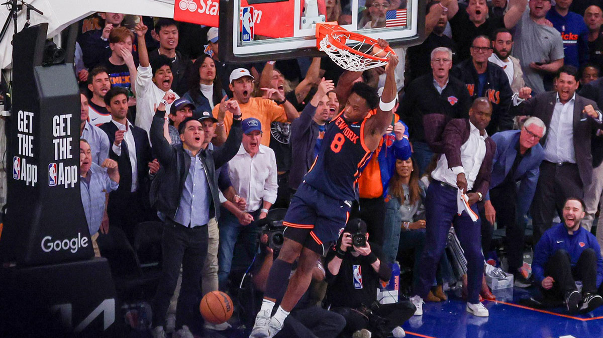 New York Knicks forward OG Anunoby (8) dunks the ball as fans celebrate in the second half during game four of the second round for the 2025 NBA Playoffs against the Boston Celtics at Madison Square Garden.