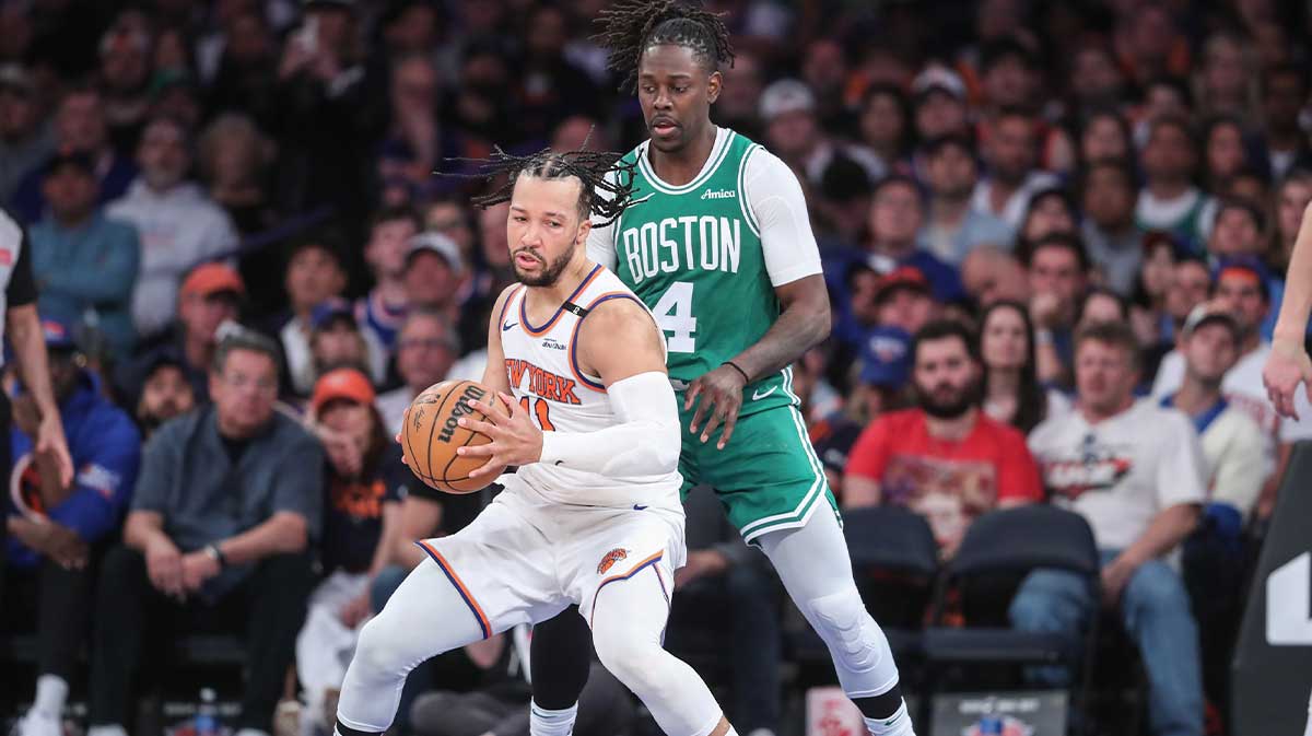 New York Knicks guard Jalen Brunson (11) looks to drive past Boston Celtics guard Jrue Holiday (4) in the third quarter during game three of the second round for the 2025 NBA Playoffs at Madison Square Garden.