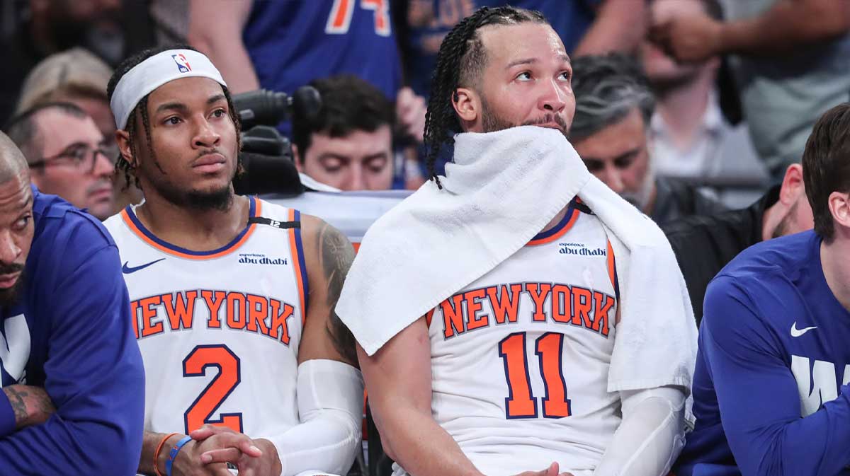 New York Knicks guards Miles McBride (2) and Jalen Brunson (11) sit on the bench in the closing minute of the fourth quarter against the Boston Celtics during game three of the second round for the 2025 NBA Playoffs at Madison Square Garden.