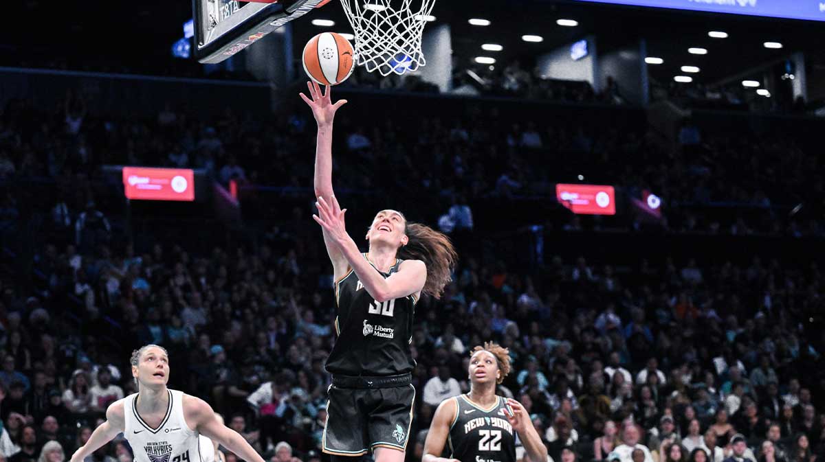 New York Liberty forward Breanna Stewart (30) drives past Golden State Valkyries forward Cecilia Zandalasini (24) during the second half at Barclays Center.