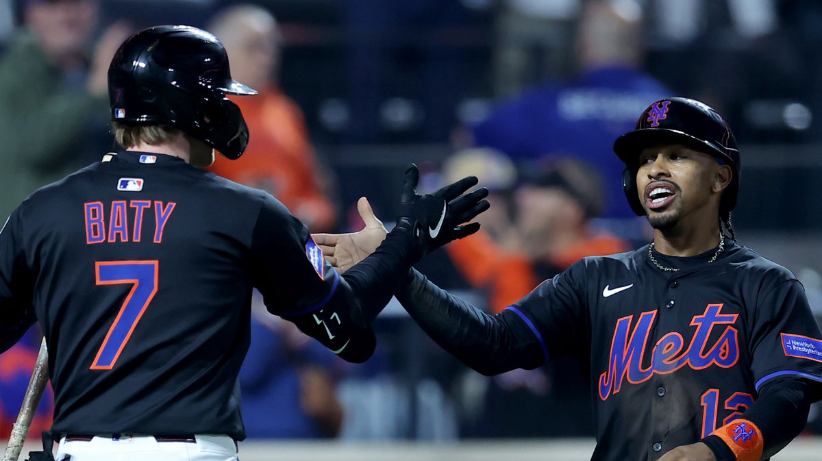 New York Mets shortstop Francisco Lindor (12) celebrates his solo home run against the Colorado Rockies with third baseman Brett Baty (7) during the eighth inning at Citi Field.