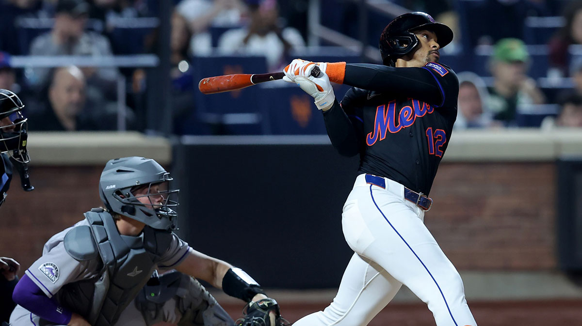 New York Mets shortstop Francisco Lindor (12) follows through on a solo home run against the Colorado Rockies during the eighth inning at Citi Field.