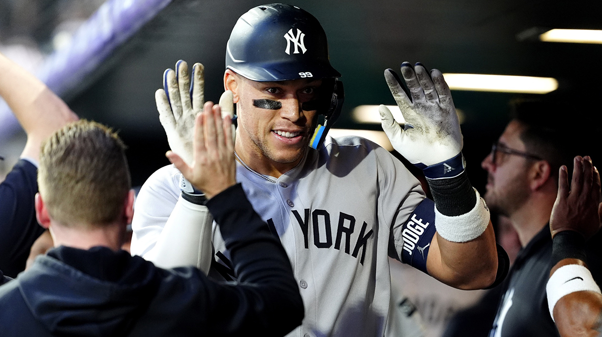 New York Yankees right fielder Aaron Judge (99) celebrates his solo home run in the fifth inning against the Colorado Rockies at Coors Field.