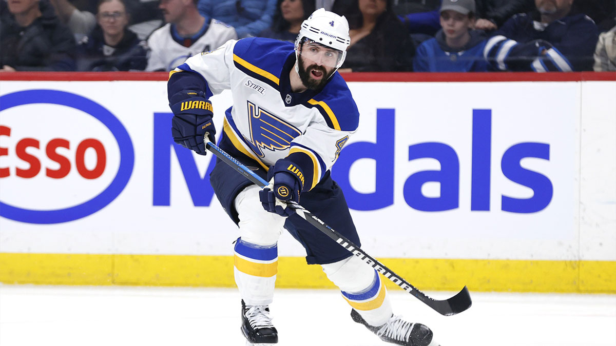 Winnipeg, Manitoba, CAN; St. Louis Blues defenseman Nick Leddy (4) shoots the puck against the Winnipeg Jets in the second period at Canada Life Centre.