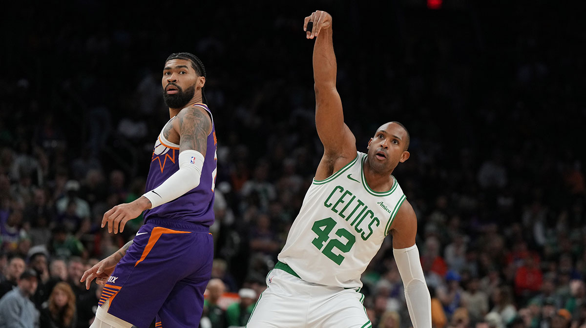 Phoenix, Arizona, USA; Boston Celtics center Al Horford (42) shoots against Phoenix Suns center Nick Richards (2) during the second half at Footprint Center.