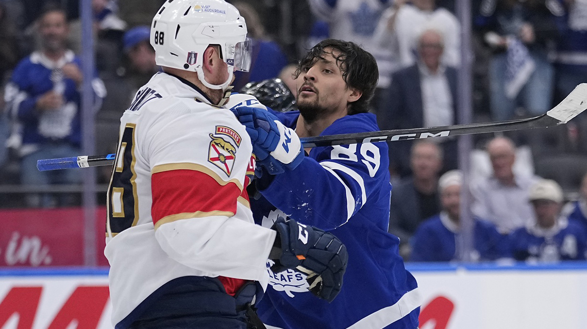 Toronto Maple Leafs forward Nicholas Robertson (89) and Florida Panthers defenseman Nate Schmidt (88) during a scrum in the third period of game five of the second round of the 2025 Stanley Cup Playoffs at Scotiabank Arena.