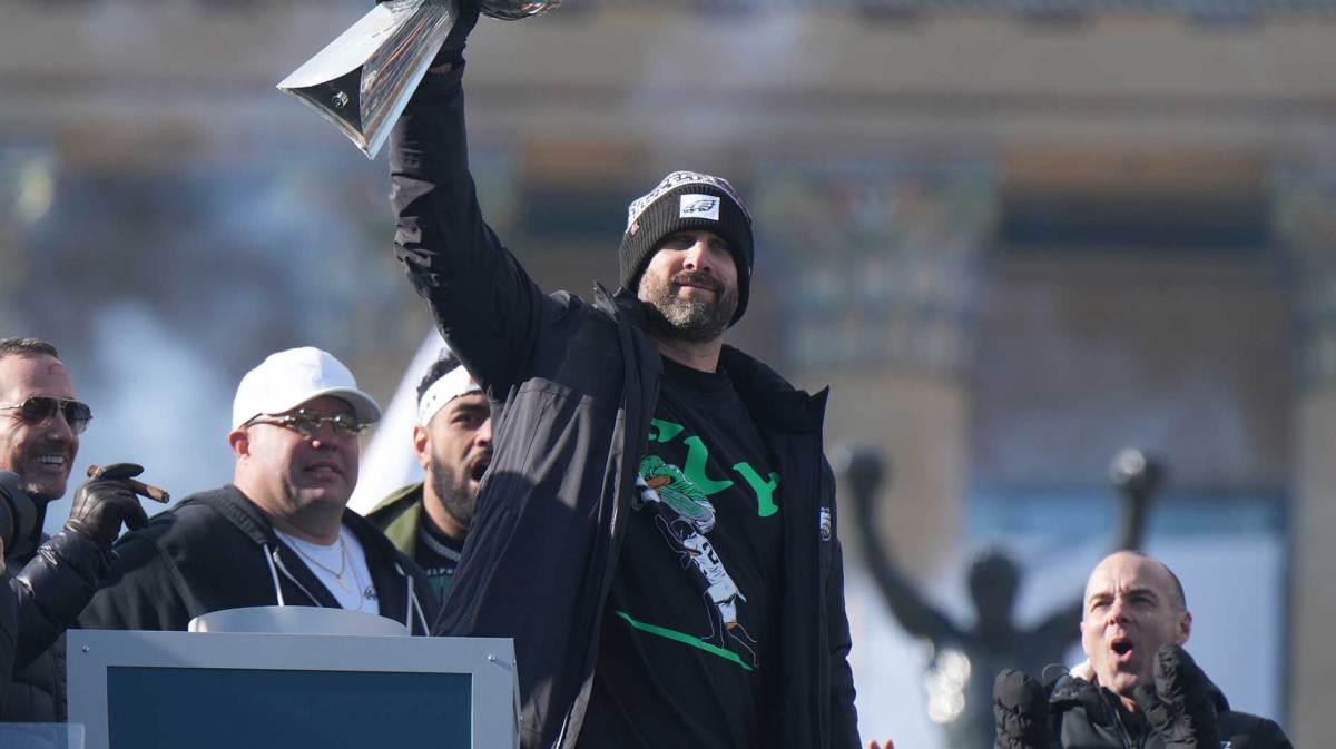 Philadelphia Eagles head coach Nick Sirianni raises the Vince Lombardi Trophy during the Super Bowl LIX championship parade and rally.