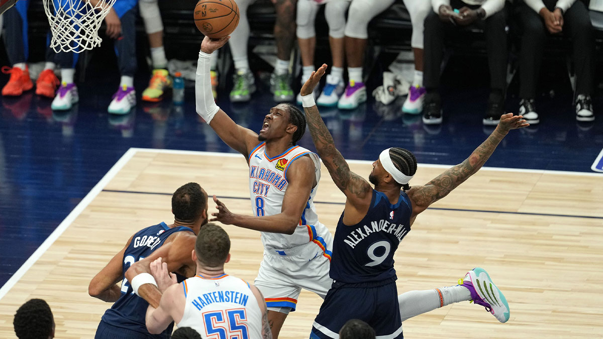 Oklahoma City Thunder forward Jalen Williams (8) shoots the ball over Minnesota Timberwolves guard Nickeil Alexander-Walker (9) in the second half during game four of the western conference finals for the 2025 NBA Playoffs at Target Center.