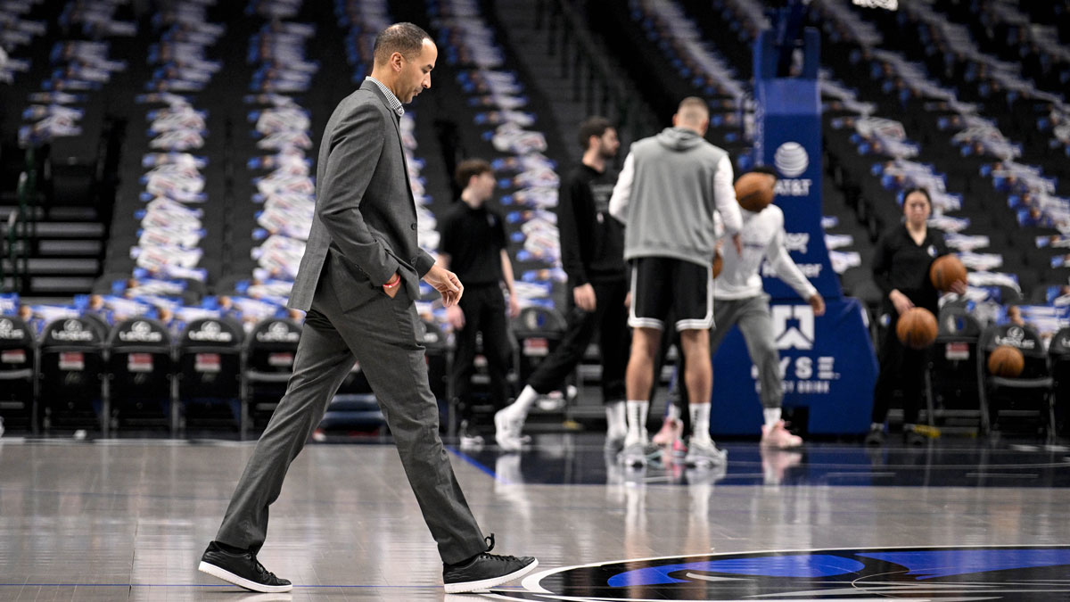 Dallas Mavericks general manager Nico Harrison walks on to the court before the game between the Dallas and the Sacramento Kings at the American Airlines Center.