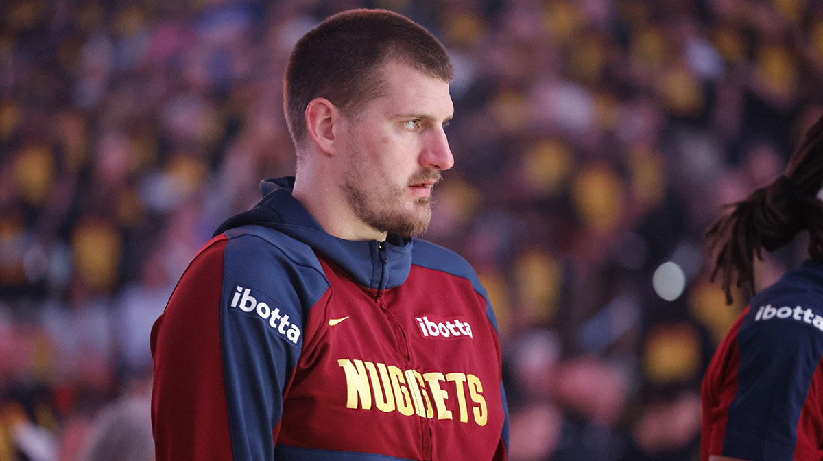 Denver Nuggets center Nikola Jokic (15) stands during the National Anthem before the start of game one of the second round for the 2025 NBA Playoffs against the Oklahoma City Thunder at Paycom Center.