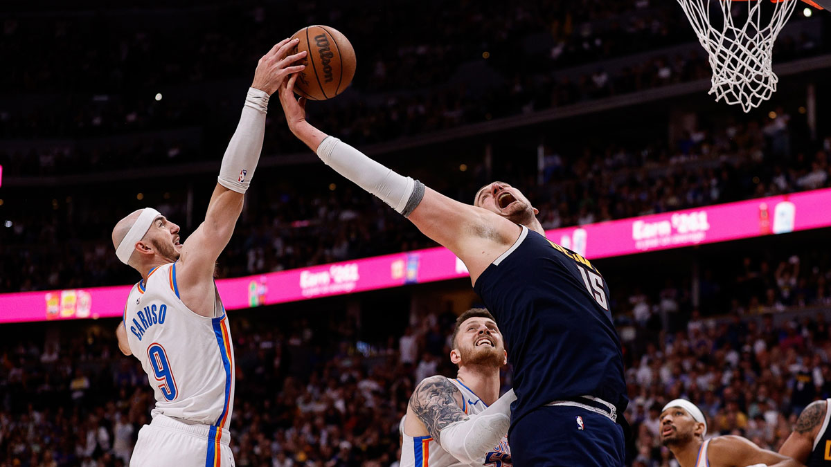Oklahoma City Thunder guard Alex Caruso (9) and Denver Nuggets center Nikola Jokic (15) battle for a rebound as center Isaiah Hartenstein (55) defends in the fourth quarter during game four of the second round of the 2025 NBA Playoffs at Ball Arena.