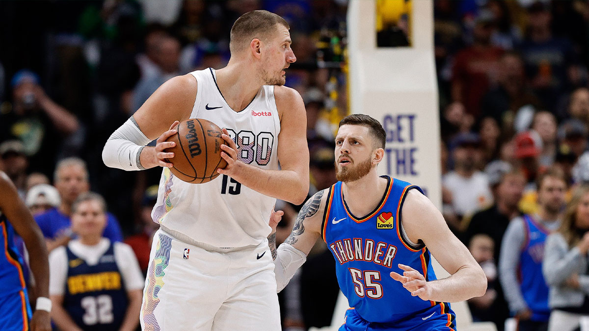 Denver Nuggets center Nikola Jokic (15) controls the ball as Oklahoma City Thunder center Isaiah Hartenstein (55) guards in the first quarter during game six of the second round for the 2025 NBA Playoffs at Ball Arena.