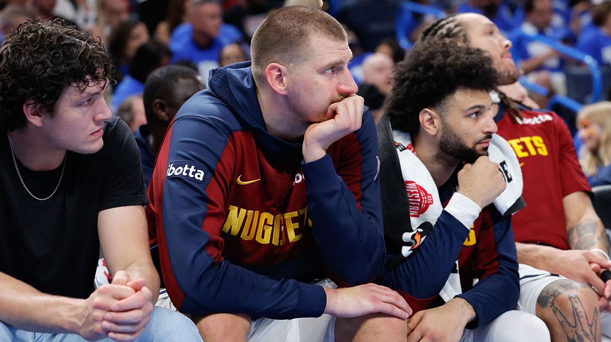 Denver Nuggets center Nikola Jokic (15) watches the final minutes of a game against the Oklahoma City Thunder from the bench in the fourth quarter during game seven of the second round for the 2025 NBA Playoffs at Paycom Center.