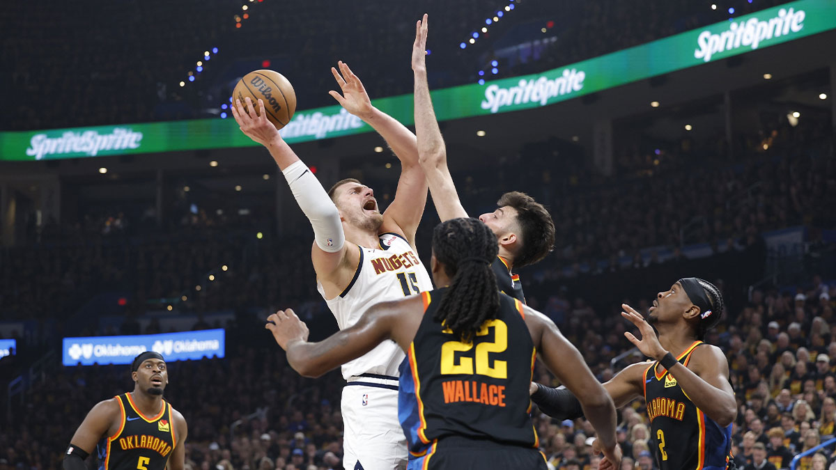 Denver Nuggets center Nikola Jokic (15) shoots against Oklahoma City Thunder forward Chet Holmgren (7) during the second quarter during game one of the second round for the 2025 NBA Playoffs at Paycom Center.
