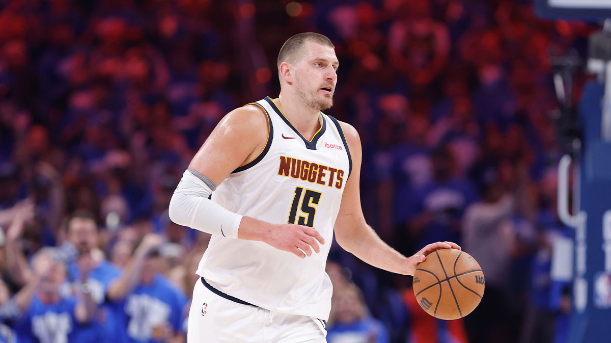 Denver Nuggets center Nikola Jokic (15) dribbles down the court against the Oklahoma City Thunder in the second quarter during game seven of the second round for the 2025 NBA Playoffs at Paycom Center.