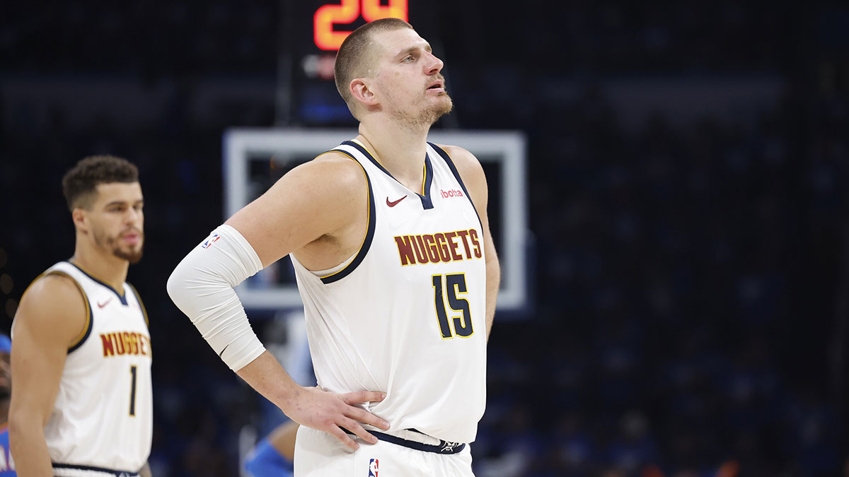 Denver Nuggets center Nikola Jokic (15) watches Oklahoma City Thunder guard Shai Gilgeous-Alexander shoot free throws in the second half of game seven of the second round for the 2025 NBA Playoffs at Paycom Center.