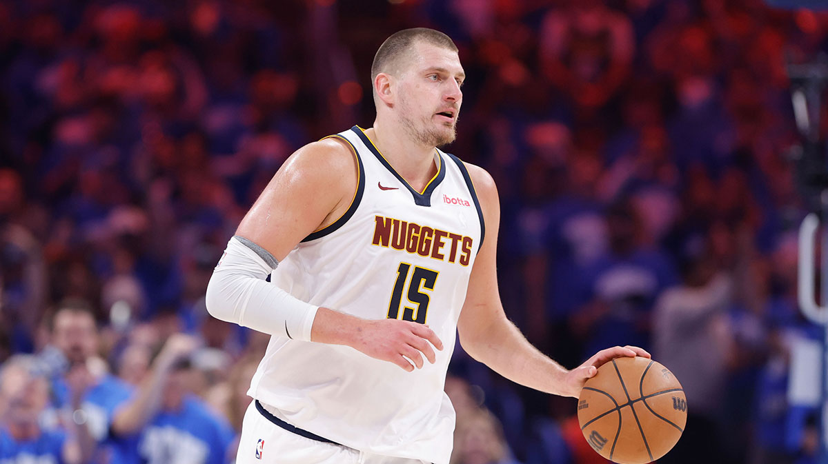 Denver Nuggets center Nikola Jokic (15) dribbles down the court against the Oklahoma City Thunder in the second quarter during game seven of the second round for the 2025 NBA Playoffs at Paycom Center.