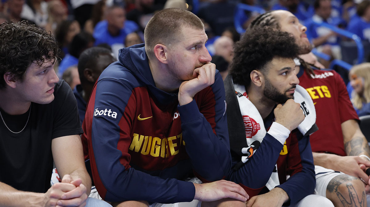 Denver Nuggets center Nikola Jokic (15) watches the game from the bench in the fourth quarter against the Oklahoma City Thunder in game seven of the second round for the 2025 NBA Playoffs at Paycom Center.