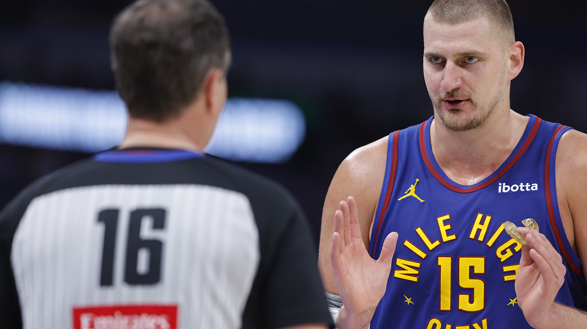 Denver Nuggets center Nikola Jokic (15) talks to an official after a play against the Oklahoma City Thunder during the second half of game five of the second round for the 2025 NBA Playoffs at Paycom Center.