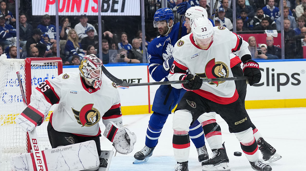 Toronto Maple Leafs left wing Max Pacioretty (67) battles for the puck with Ottawa Senators defenseman Nikolas Matinpalo (33) in the third period during game five of the first round of the 2025 Stanley Cup Playoffs at Scotiabank Arena.