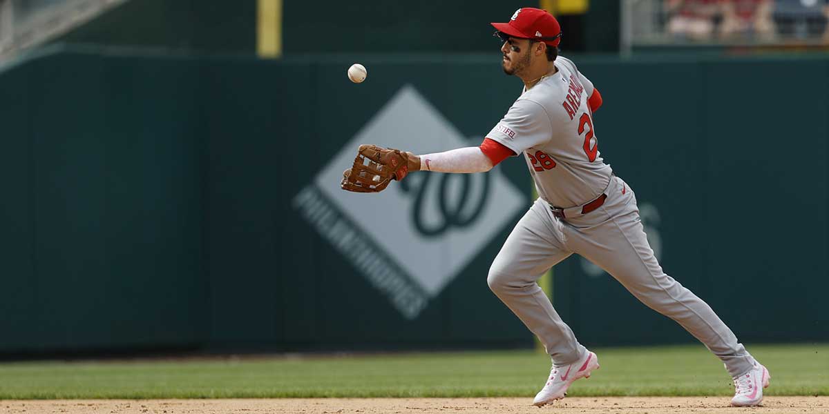 St. Louis Cardinals third base Nolan Arenado (28) bobbles a ground ball hit by Washington Nationals first base Nathaniel Lowe (not pictured) during the ninth inning at Nationals Park.