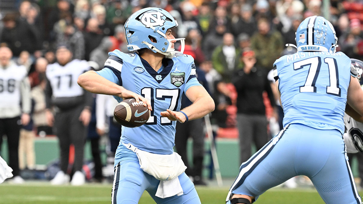 North Carolina Tar Heels quarterback Michael Merdinger (17) throws a pass against the Connecticut Huskies during the first half at Fenway Park.