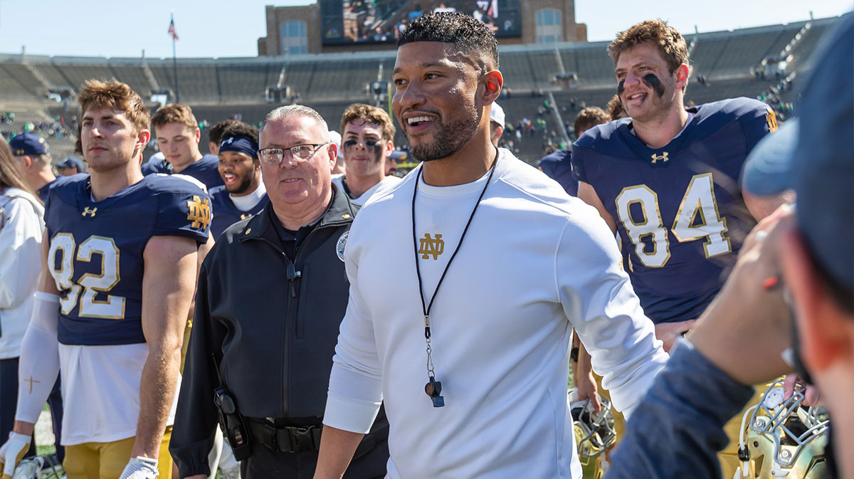 Notre Dame Fighting Irish head coach Marcus Freeman smiles as he walks off the field after the Blue-Gold game at Notre Dame Stadium.