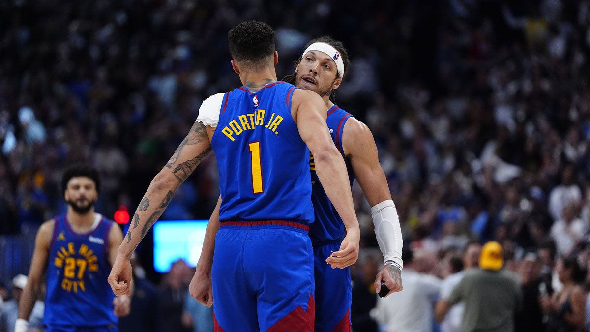 Nuggets forward Aaron Gordon (32) celebrates his three point score with forward Michael Porter Jr. (1) in the fourth quarter against the Oklahoma City Thunder during game three of the second round for the 2025 NBA Playoffs at Ball Arena