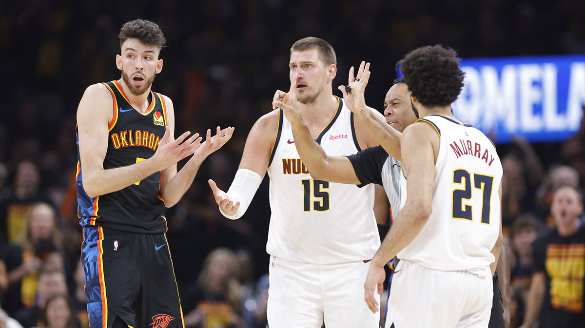 Oklahoma City Thunder forward Chet Holmgren (7) and Denver Nuggets center Nikola Jokic (15) react to a play during the second half in game one of the second round for the 2025 NBA Playoffs at Paycom Center.