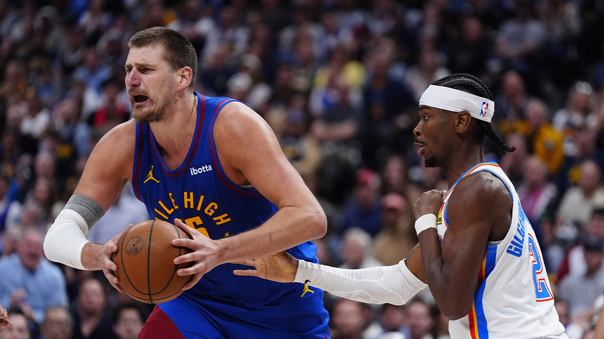 Oklahoma City Thunder guard Shai Gilgeous-Alexander (2) defends on Denver Nuggets center Nikola Jokic (15) in the second half during game three of the second round for the 2025 NBA Playoffs at Ball Arena.