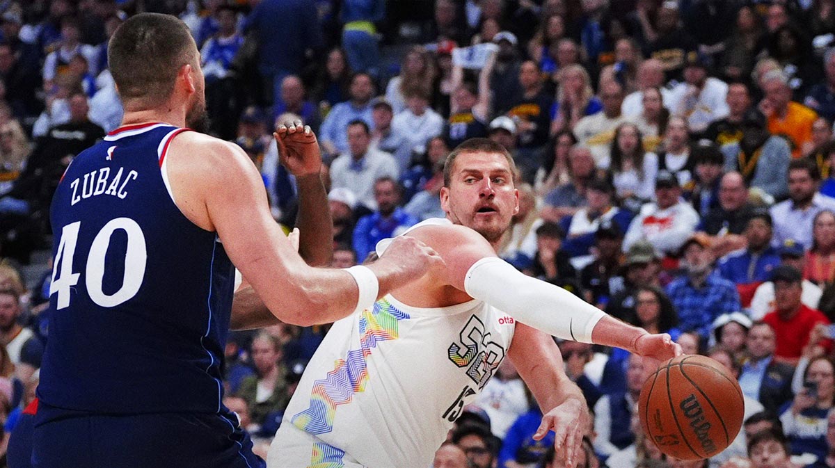 LA Clippers center Ivica Zubac (40) defends Denver Nuggets center Nikola Jokic (15) in the second half during game five of the first round for the 2025 NBA Playoffs at Ball Arena.