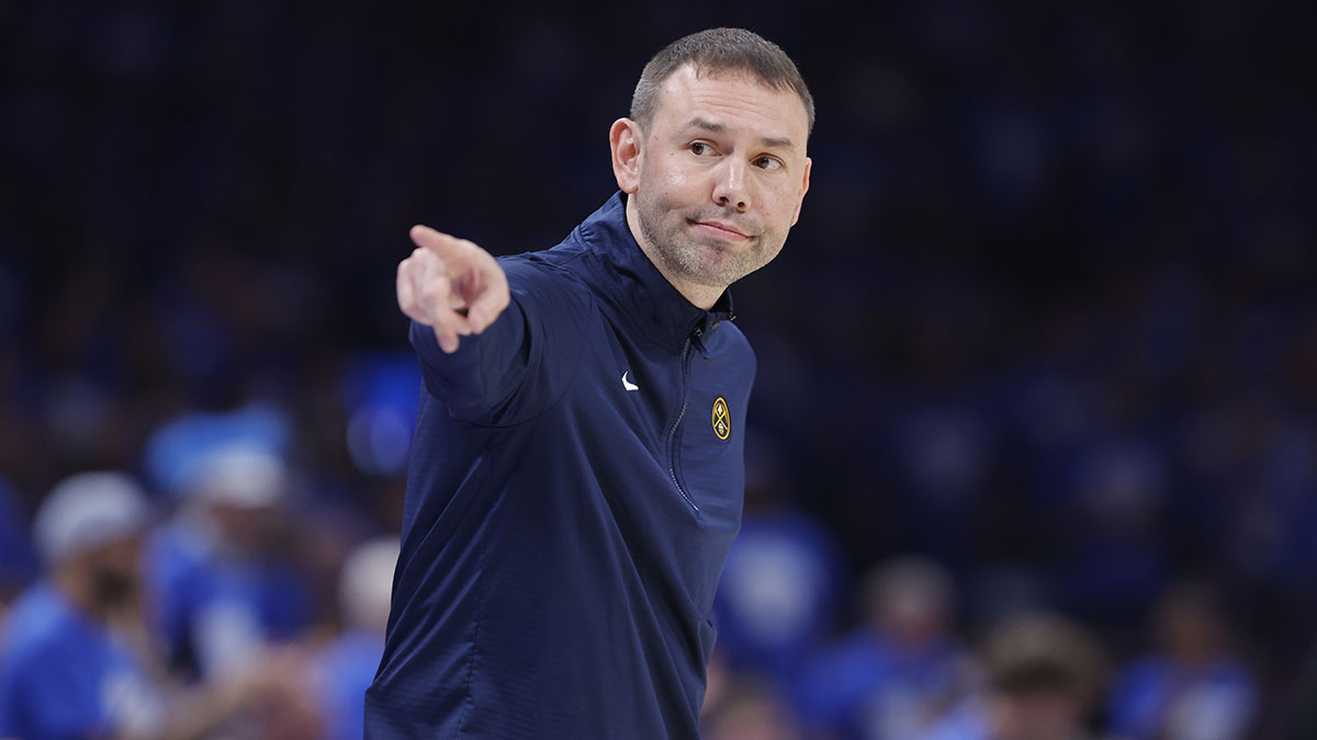 Nuggets head coach David Adelman points down the court during a play against the Oklahoma City Thunder in the second quarter during game seven of the second round for the 2025 NBA Playoffs at Paycom Center