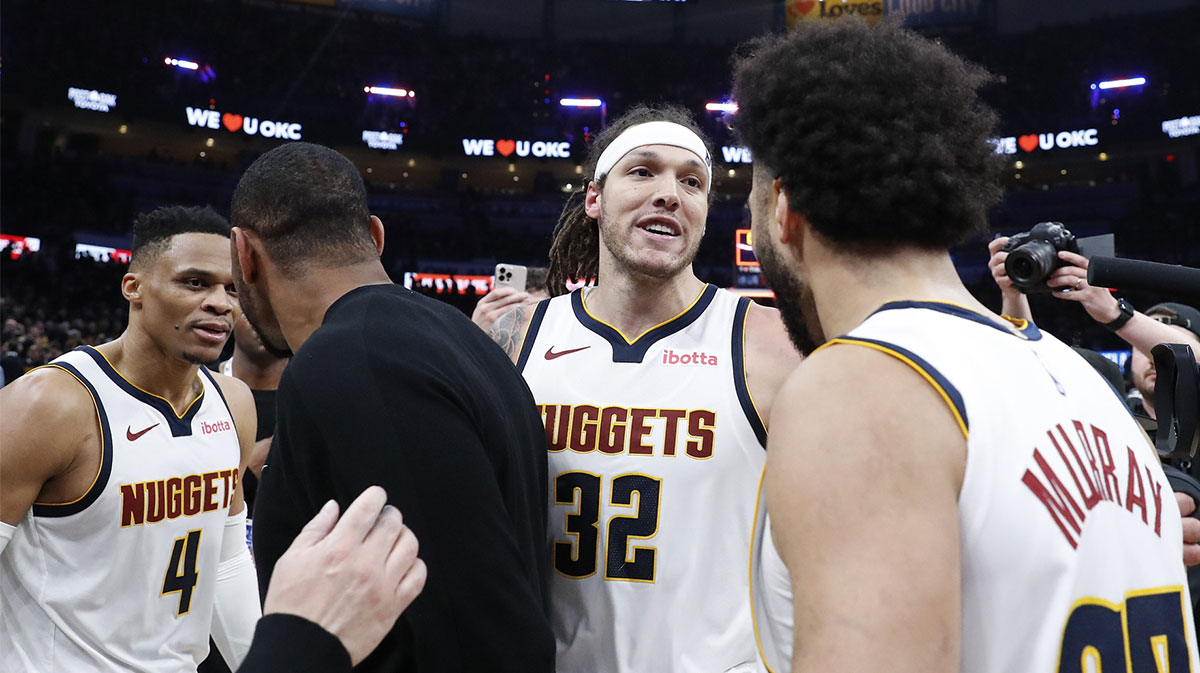 Nuggets forward Aaron Gordon (32) celebrates with Russell Westbrook