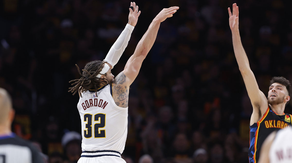 Nuggets forward Aaron Gordon (32) shoots a three point basket to win