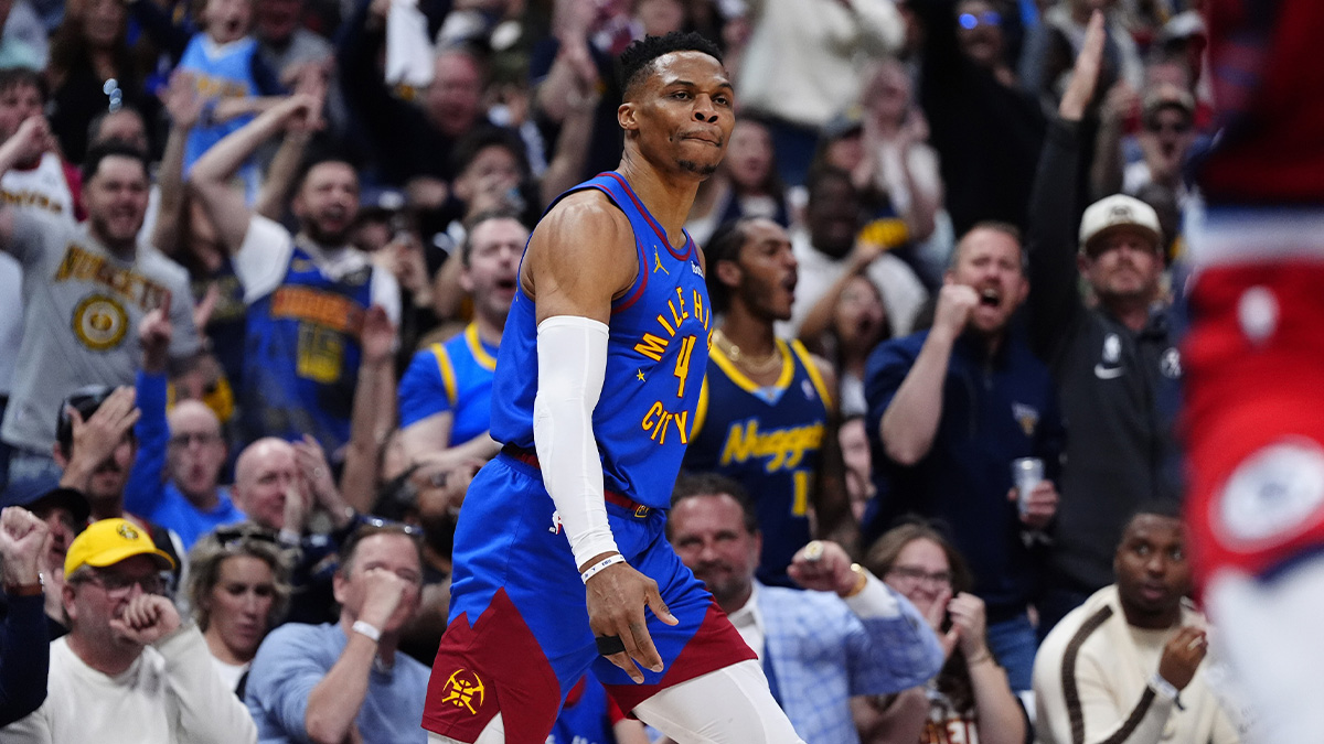 Nuggets guard Russell Westbrook (4) reacts after a three point score in the second quarter against the LA Clippers during game seven of first round for the 2025 NBA Playoffs at Ball Arena next to Mark Daigneault